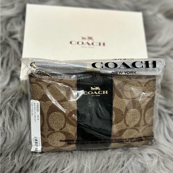 Coach Handbags - NIB Coach Wristlet Brand New w/ Plastic & Box !